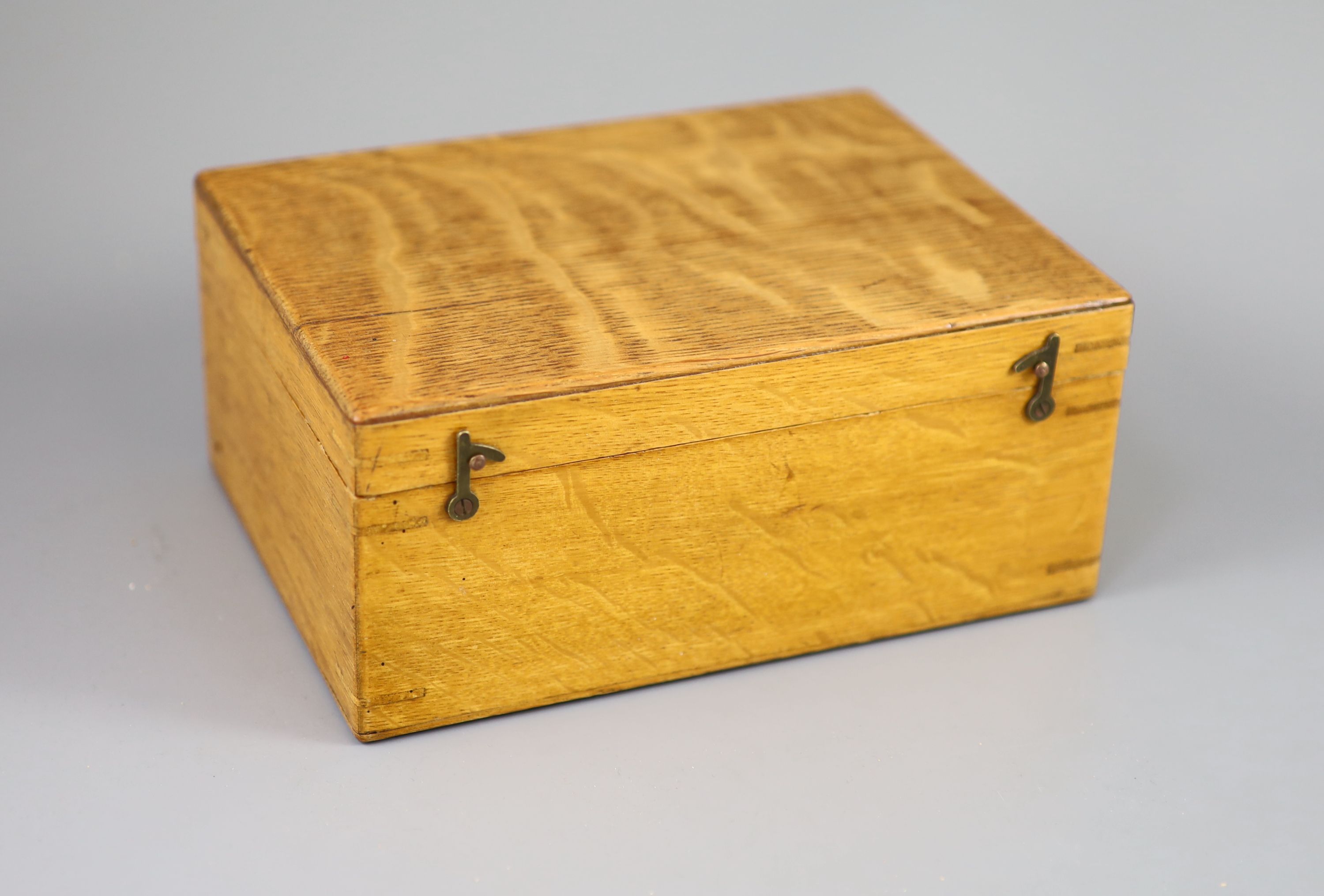 A Jaques & Son Staunton 3 1/2 boxwood and weighted chess set in original golden oak box, c.1910, 8 x 5.75 x 3.5in.